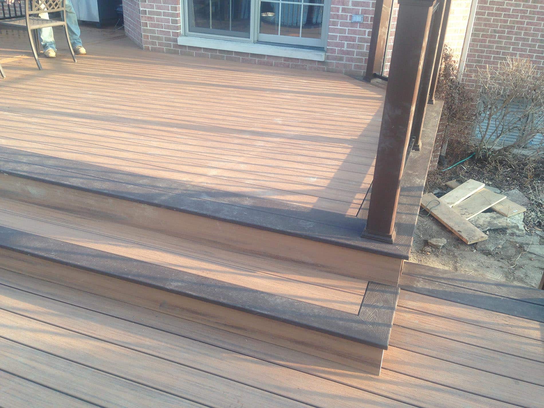 brown raised deck with railing 10