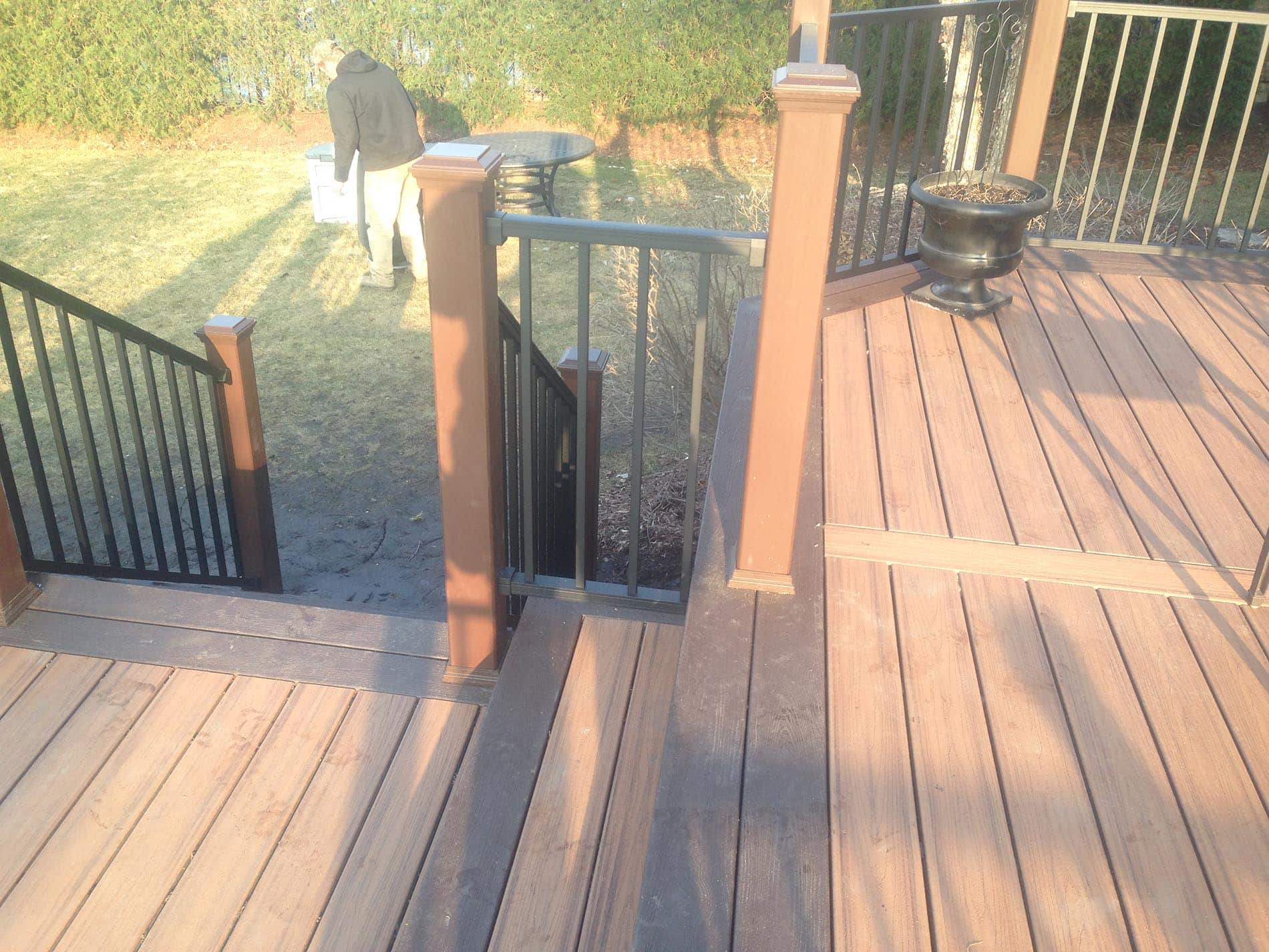 brown raised deck with railing 11