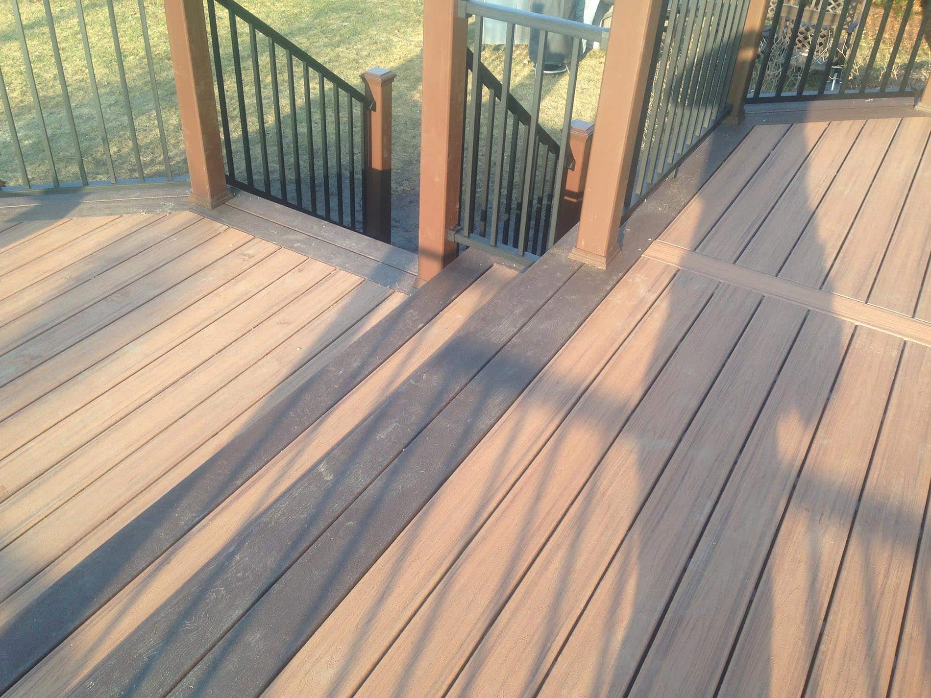 brown raised deck with railing 2