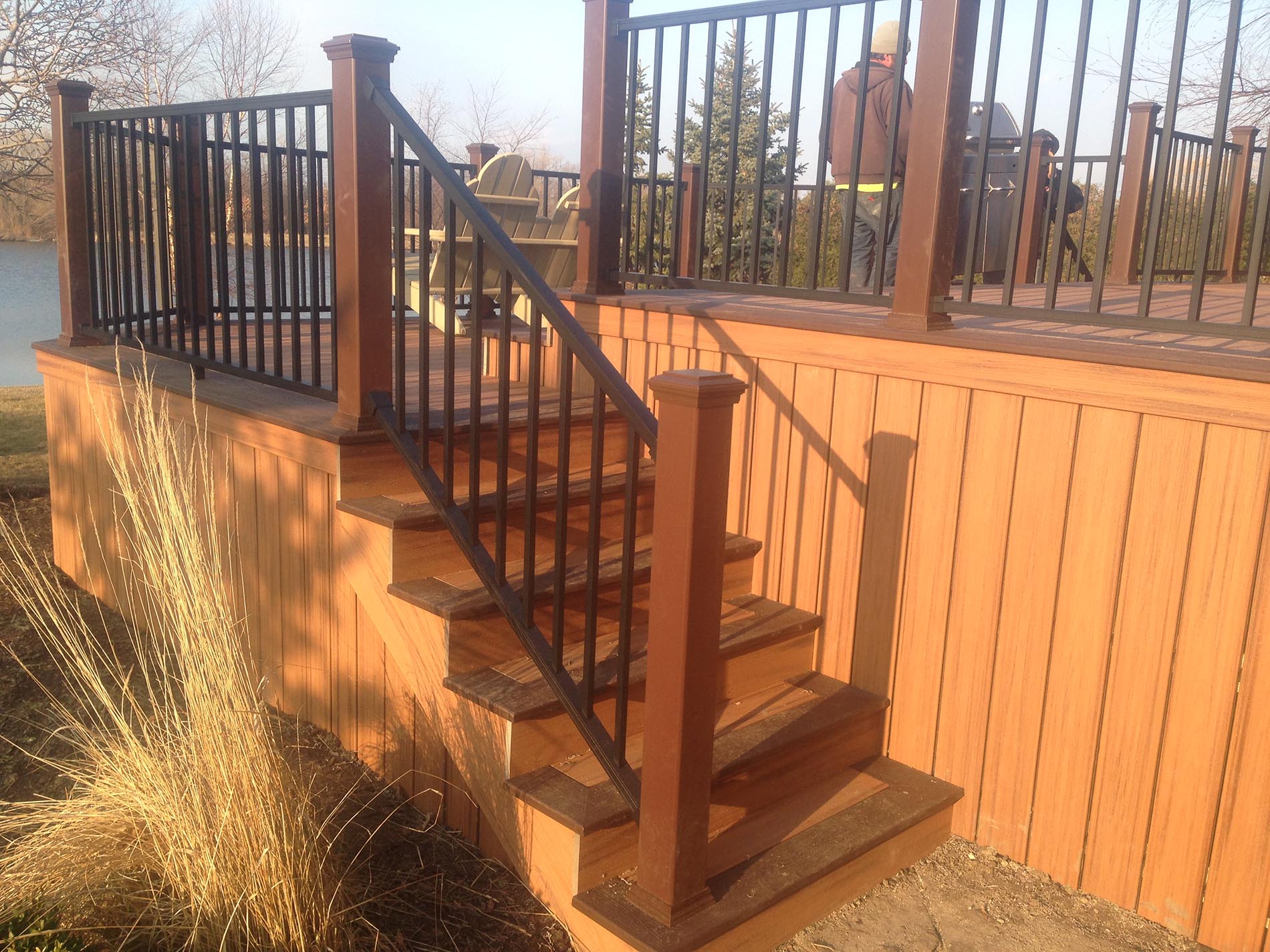 brown raised deck with railing 5