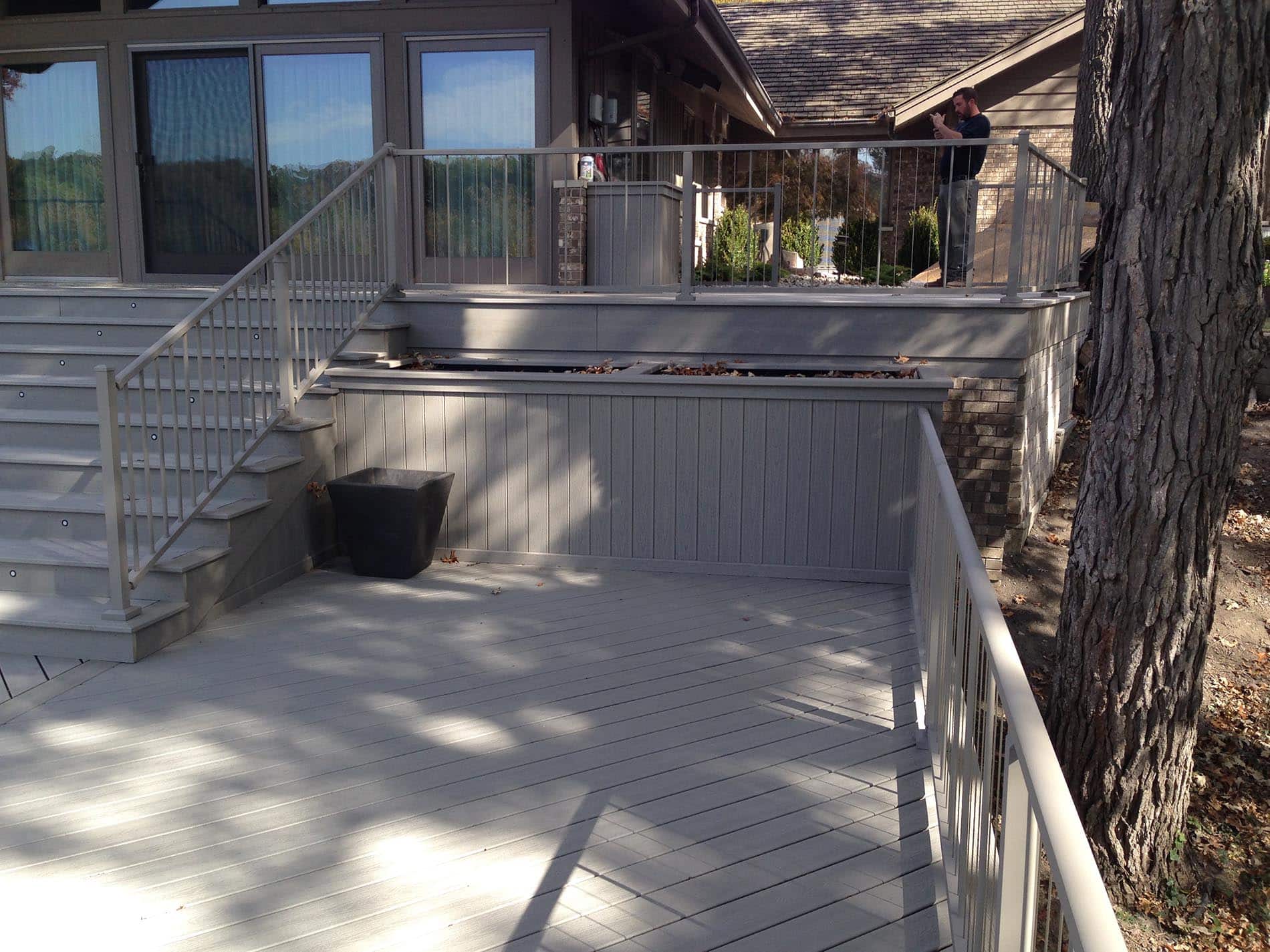 gray deck with metal railing 11