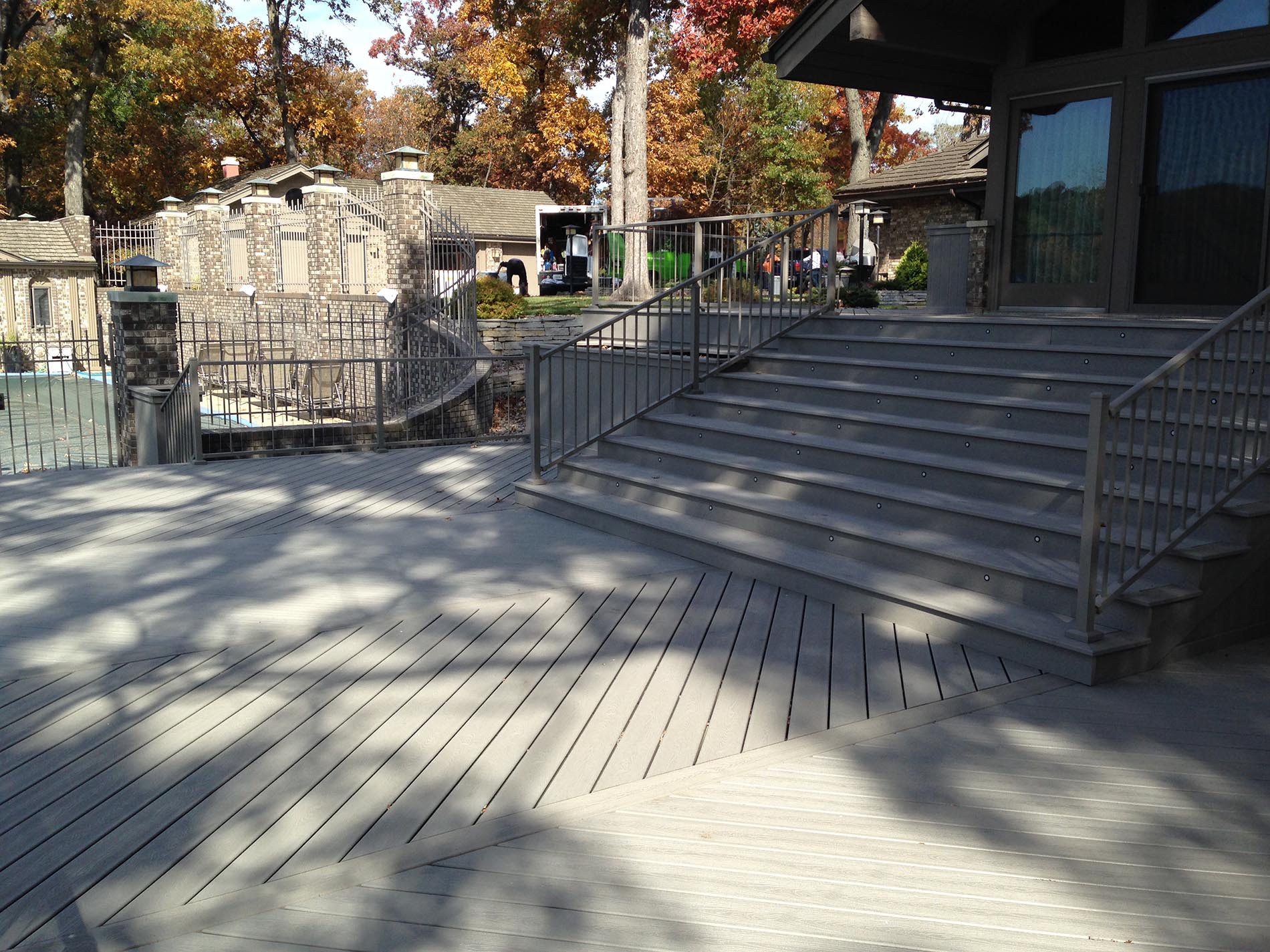 gray deck with metal railing 13