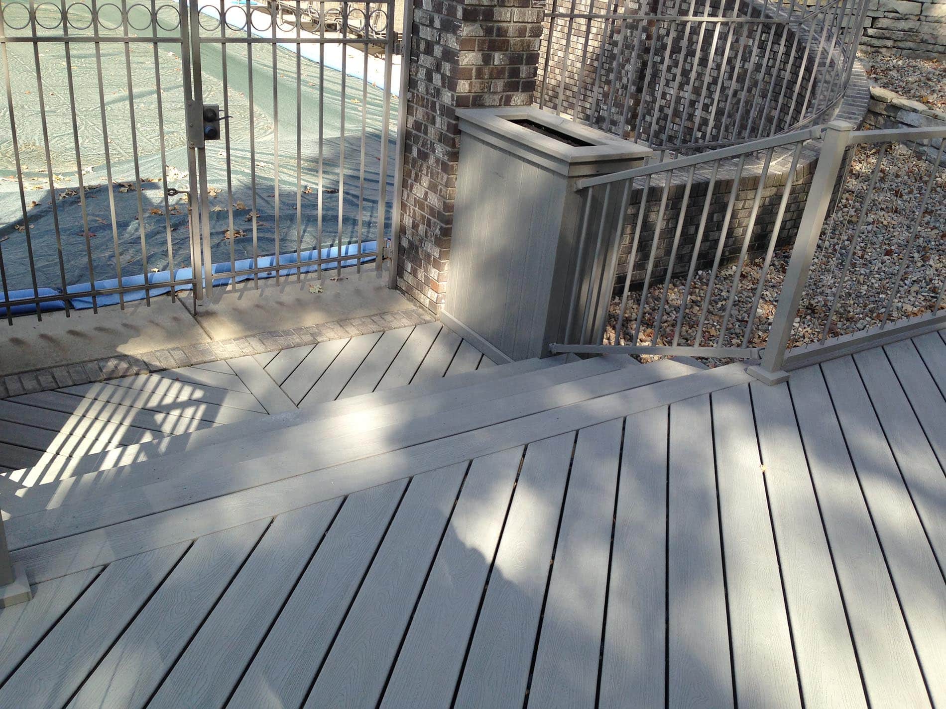 gray deck with metal railing 17