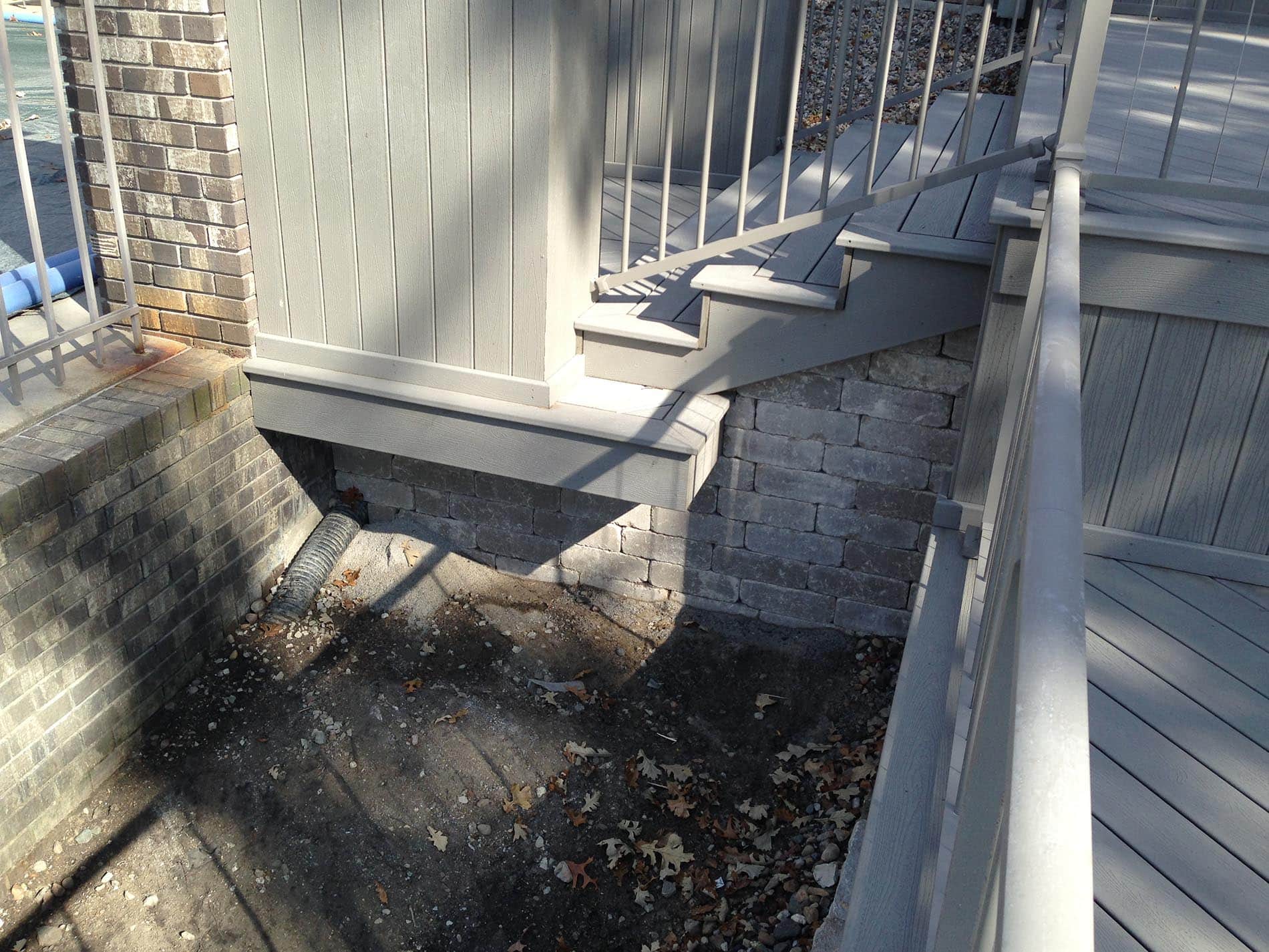 gray deck with metal railing 26