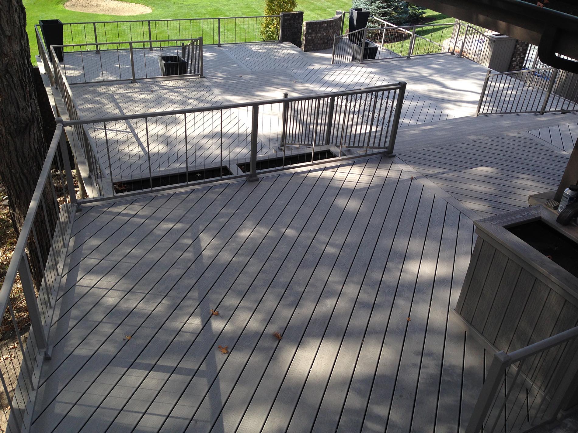 gray deck with metal railing 27