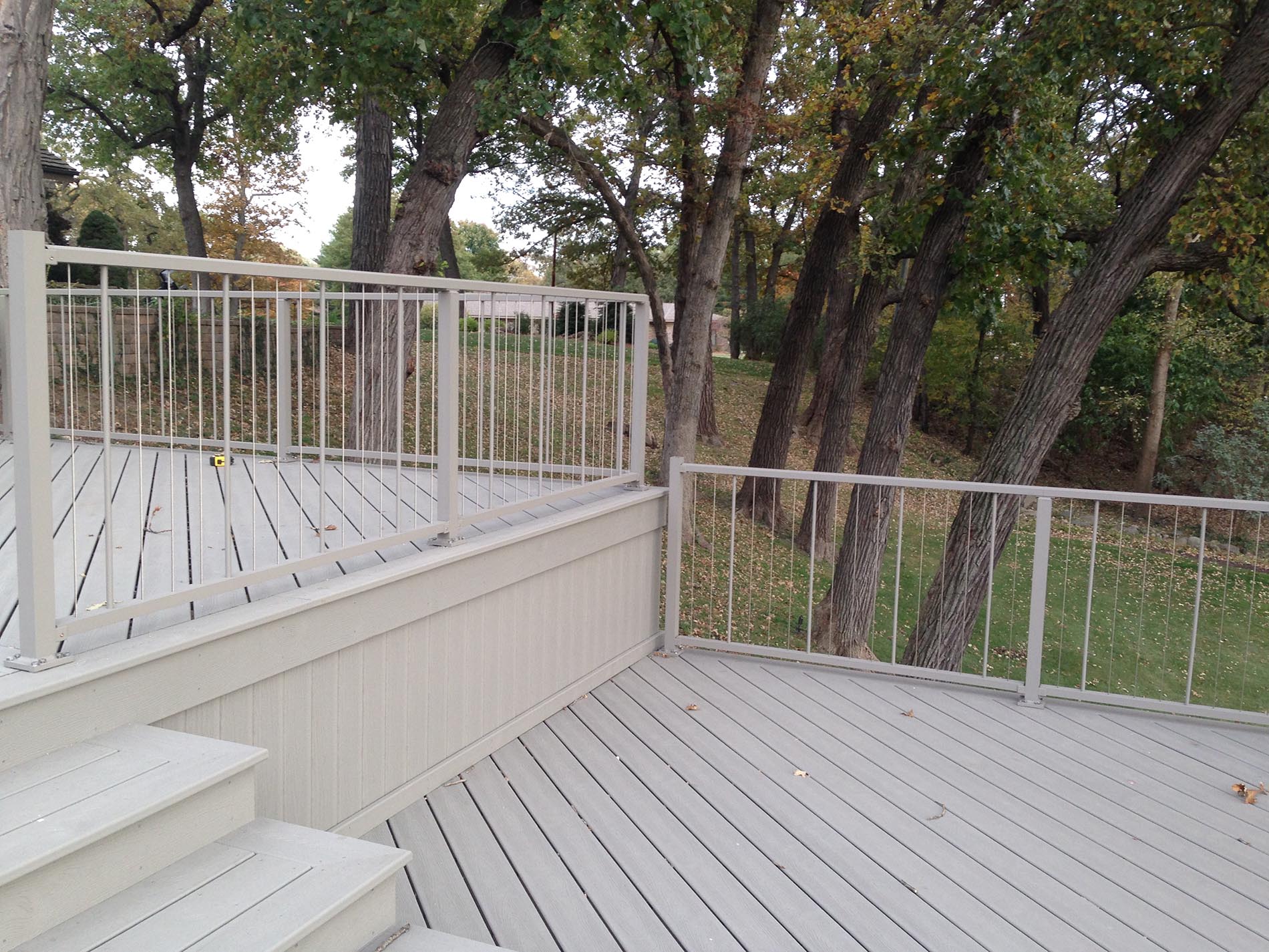 gray deck with metal railing 4